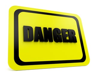 Yellow-black danger sign over a white background.jpeg